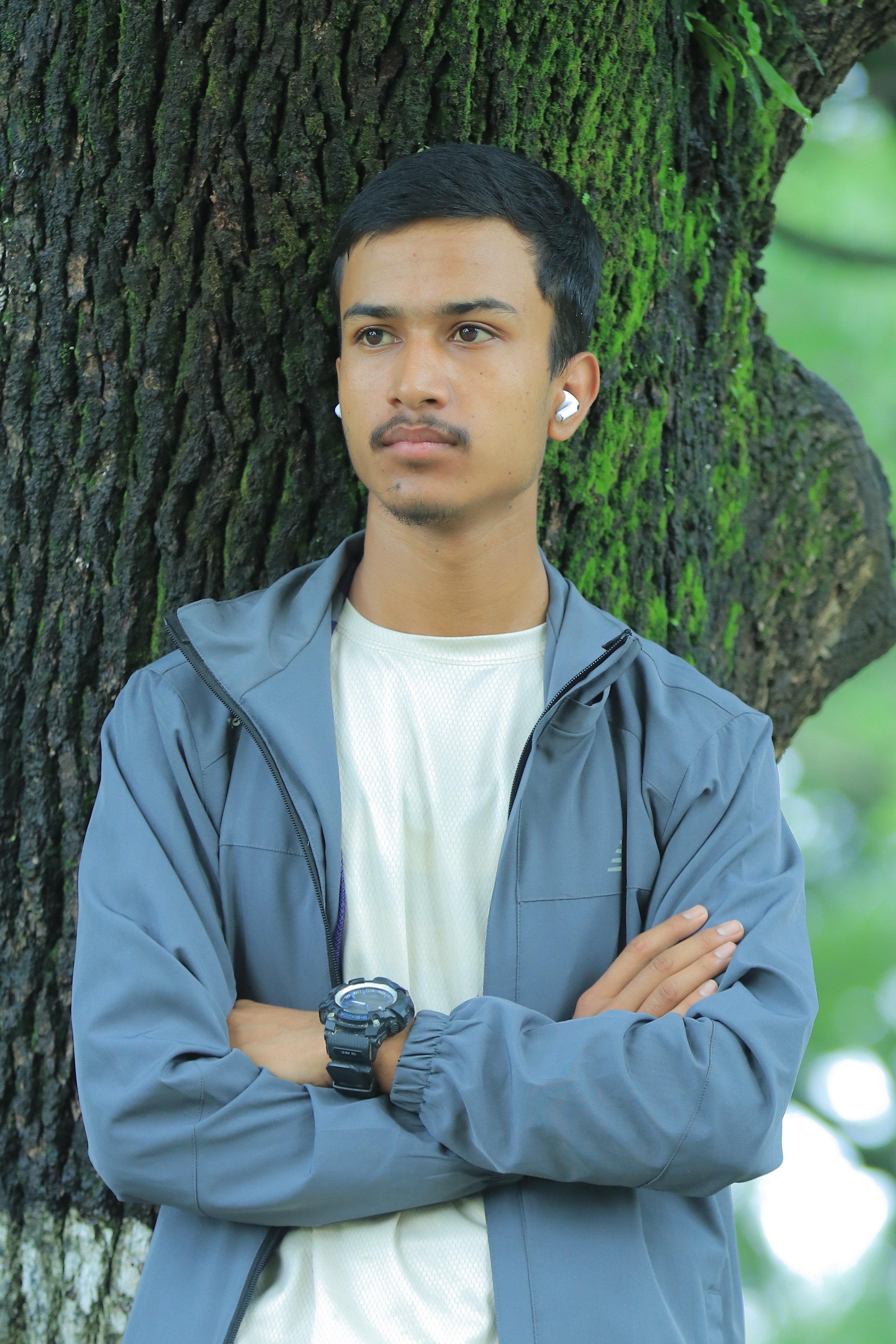 Kiran Mahara, a professional IT specialist with a confident and friendly demeanor